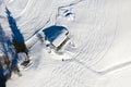 Snow covered remote cottage, homestead in the mountains and ski sloap Royalty Free Stock Photo