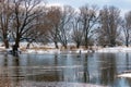 Snow-covered river bank in winter. Winter landscape Royalty Free Stock Photo
