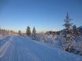 Snow covered road and Himingen in the Lifjell mountain plateau in winter