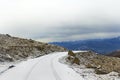 Snow-covered road on a mountain pass Royalty Free Stock Photo