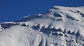 Snow covered rock layers. Mount Mittaghorn Royalty Free Stock Photo