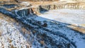 Snow covered rock quarry in winter Royalty Free Stock Photo