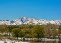 Snow Covered Rocky Mountain Foothills from Lakewood, Colorado in Spring Royalty Free Stock Photo