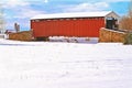 Snow covered roof, of red, wood, covered bridge, Royalty Free Stock Photo