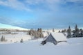 Snow covered rural outbuilding