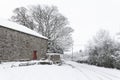 Tyre tracks on a snowy country lane Royalty Free Stock Photo