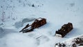 Old mine vehicles at Falun copper mine pit in winter in Sweden Royalty Free Stock Photo