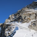 Snow covered stairs leading to the Esel, one of the peaks of Mount Pilatus. Royalty Free Stock Photo