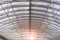 Snow-covered steel ceiling in the form of an arch