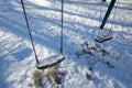 Snow covered swings