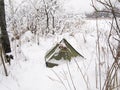 Snow-covered tent in the woods Royalty Free Stock Photo