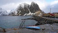 Most famous Norwegian mountain and Reinefjorden from Toppoy island on the Lofoten in Norway in winter