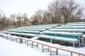 Snow covered tribune in a deserted park. Winter. Russia Royalty Free Stock Photo