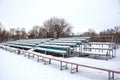 Snow covered tribune in a deserted park. Winter. Russia Royalty Free Stock Photo