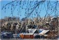 Snow-covered village  in the middle of the forest Royalty Free Stock Photo
