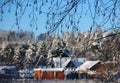 Snow-covered village  in the middle of the forest Royalty Free Stock Photo