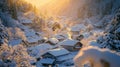 Snow-Covered Village in a Mountain Valley at Sunset Royalty Free Stock Photo