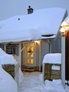 Snow-covered winterly house entrance