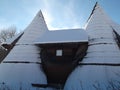 The Snow covered wooden bungalow