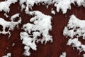 Snow covering the metal rust surfaces similar to the world map. abstract background Royalty Free Stock Photo