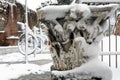 Snow covers the streets of Rome, Italy. Detail of an ancient Rom