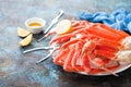 Snow crab legs plate with lemon and butter sauce Royalty Free Stock Photo