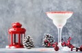Snow daiquiri, Christmas or New Year alcoholic cocktail with rum and cream with red decor in festive setting, copy space