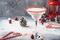 Snow daiquiri, Christmas or New Year alcoholic cocktail with rum and cream with red decor in festive setting, copy space