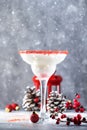 Snow daiquiri, Christmas or New Year alcoholic cocktail with rum and cream with red decor in festive setting, copy space