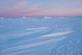 Snow desert at sunrise. Northern Ural mountains, Russia