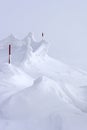 Snow drift at top of mountain Royalty Free Stock Photo