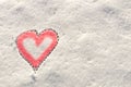 Snow with drown red heart shape.