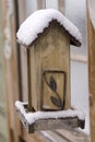 Snow on an Empty Bird Feeder Royalty Free Stock Photo