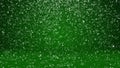 Snow fall and settle on the surface. Green winter background as place for advertisement or logo, Christmas or New Year