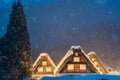 Snow falling on light Up Festival in winter at shirakawago Gifu Chubu Japan