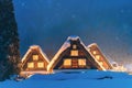 Snow falling on light Up Festival in winter at shirakawago Gifu Chubu Japan