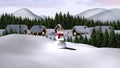 Snow falling over snowwoman, multiple trees and houses on winter landscape