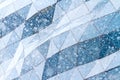 Snow flakes on a background of beautiful diamond of glass walls