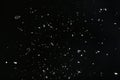 Snow flakes falling on black background Royalty Free Stock Photo