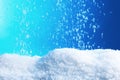 Snow flakes falling on blue background Royalty Free Stock Photo