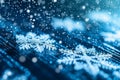 Snow flakes are falling down against a blue background, creating a serene winter scene, Binary code forming beautiful snowflakes Royalty Free Stock Photo