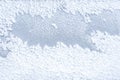Snow on the glass closeup. Winter background. Soft focus. Snow Texture Close-Up Royalty Free Stock Photo