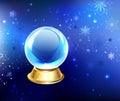 Snow globe on a blue background Royalty Free Stock Photo