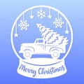 Snow globe with christmas truck, tree, snowflakes, stars. Merry Christmas phrase. Holiday symbols Royalty Free Stock Photo