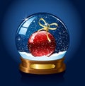 Snow globe with red christmas ball Royalty Free Stock Photo