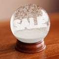 Snow globe with sale word inside Royalty Free Stock Photo