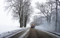 Snow gritter sprinkle salt on the road