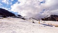 Snow groomer preparing slopes and pistes, Livigno village, Italy, Alps Royalty Free Stock Photo