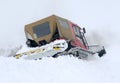 Ratrack snow groomer advancing in deep snow Royalty Free Stock Photo