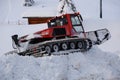 Snow groomers bulldozer tracks on the snow